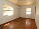 This bedroom features natural light and a ceiling fan at 1040 Santa Anita St, Orlando, FL 32808
