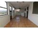 Large enclosed laundry room with tile floor, and bright windows at 1040 Santa Anita St, Orlando, FL 32808