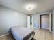 Comfortable bedroom with closet space, perfect for relaxation and rest at 1469 Swan Pl, Kissimmee, FL 34759
