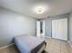 Comfortable bedroom with closet space, perfect for relaxation and rest at 1469 Swan Pl, Kissimmee, FL 34759