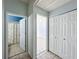 Hallway featuring access to a bathroom and bedroom and a closet at 1469 Swan Pl, Kissimmee, FL 34759