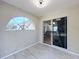 Inviting sun room with large window and sliding door access to the main house at 1469 Swan Pl, Kissimmee, FL 34759