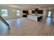 Bright, open kitchen features an island, pendant lighting and ample cabinet space at 1664 Andover Ridge Dr, Deland, FL 32720