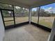 Enclosed patio with lots of light and a view of the lawn at 1664 Andover Ridge Dr, Deland, FL 32720