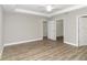 Large bedroom with ceiling fan and access to closet at 199 Juniper Way, Ocala, FL 34472