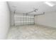 Spacious garage with automatic door opener and ample storage space at 199 Juniper Way, Ocala, FL 34472