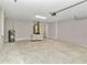 Attached garage with utility area and interior access at 199 Juniper Way, Ocala, FL 34472