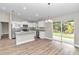 Modern kitchen with stainless steel appliances and breakfast bar at 199 Juniper Way, Ocala, FL 34472