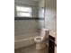 Traditional bathroom with tiled shower-tub and vanity at 2302 E Dana Dr, Deltona, FL 32738