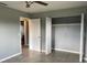 Cozy bedroom offering a closet and neutral paint at 2302 E Dana Dr, Deltona, FL 32738