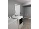 Functional laundry room with a washer and dryer ready for use at 2302 E Dana Dr, Deltona, FL 32738
