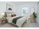 Bright bedroom with large window, modern decor, and neutral tones create a relaxing space at 473 Disa Dr, Davenport, FL 33837