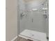 Bathroom with a large walk-in shower and gray tile at 3780 Plainview Dr, Orlando, FL 32824