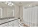 Clean bathroom with granite countertop and shower at 3780 Plainview Dr, Orlando, FL 32824