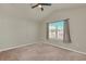 Bright bedroom with ceiling fan and window at 3780 Plainview Dr, Orlando, FL 32824