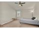 Cozy bedroom with window and floor lamp at 3780 Plainview Dr, Orlando, FL 32824