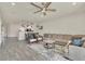 Spacious living room with a comfortable couch and tile floors at 3780 Plainview Dr, Orlando, FL 32824