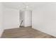 Simple bedroom with hardwood floors and ceiling fan at 531 Sanctuary Golf Pl, Apopka, FL 32712