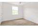 Bright bedroom with wood-look floors and ceiling fan at 531 Sanctuary Golf Pl, Apopka, FL 32712