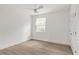 Bright bedroom with wood-look floors and ceiling fan at 531 Sanctuary Golf Pl, Apopka, FL 32712