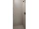 Clean shower with tile surround and modern fixtures at 531 Sanctuary Golf Pl, Apopka, FL 32712