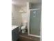 Cozy bathroom with a toilet, vanity, and tiled shower, creating a functional and inviting space at 766 Carlson Dr, Orlando, FL 32804
