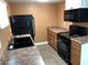 Well-equipped kitchen features modern appliances and laminate countertops, maximizing space at 766 Carlson Dr, Orlando, FL 32804