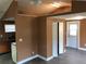 Versatile living space with kitchen, closet, and front door features neutral wall colors at 766 Carlson Dr, Orlando, FL 32804