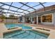 Resort-style pool and spa with covered lanai at 3819 Isle Vista Ave, Belle Isle, FL 32812