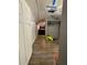 Bedroom featuring wood-look floors and closet with hanging rack at 5165 Gwynne Ave, Orlando, FL 32810