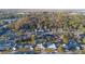 Aerial view of neighborhood, highlighting a house with a pool at 610 Alton Rd, Winter Springs, FL 32708