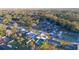 Aerial view of residential neighborhood showing home with pool at 610 Alton Rd, Winter Springs, FL 32708