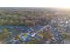 Aerial view of a residential neighborhood featuring a house with a pool at 610 Alton Rd, Winter Springs, FL 32708