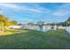 Large backyard with a pool and fence at 610 Alton Rd, Winter Springs, FL 32708