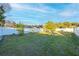 Large grassy backyard with a privacy fence at 610 Alton Rd, Winter Springs, FL 32708
