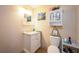 Clean bathroom with vanity, toilet, and medicine cabinet at 610 Alton Rd, Winter Springs, FL 32708