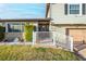 Inviting front door entrance with a stone facade and white railing at 610 Alton Rd, Winter Springs, FL 32708