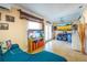 Gathering room with large screen TV and comfortable seating at 610 Alton Rd, Winter Springs, FL 32708