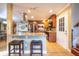 Kitchen with granite counters, stainless steel appliances, and breakfast bar at 610 Alton Rd, Winter Springs, FL 32708