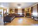 Spacious living room with a cozy fireplace and L-shaped sectional sofa at 610 Alton Rd, Winter Springs, FL 32708