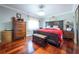 Bright bedroom with hardwood floors and ample closet space at 610 Alton Rd, Winter Springs, FL 32708