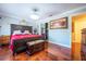 Large main bedroom with hardwood floors and walk-in closet at 610 Alton Rd, Winter Springs, FL 32708