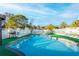 Inviting kidney-shaped pool with a large backyard at 610 Alton Rd, Winter Springs, FL 32708