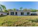 Back of the house with a large yard at 765 W Lansdowne Ave, Orange City, FL 32763
