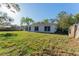 Back of the house with a large yard at 765 W Lansdowne Ave, Orange City, FL 32763
