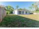 Back of the house with a large yard at 765 W Lansdowne Ave, Orange City, FL 32763