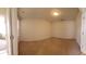 Carpeted bedroom features neutral walls and a window to provide natural light at 8343 Bella Tierra Ct # 8343, Davenport, FL 33896