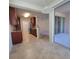 Well-appointed kitchen with granite countertops, stainless steel appliances, and convenient breakfast bar at 8343 Bella Tierra Ct # 8343, Davenport, FL 33896