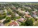 A bird's-eye view illustrates the home's position within a peaceful and well-maintained neighborhood at 1608 Bomi Cir, Winter Park, FL 32792