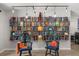 Unique bookcase featuring pendant lights and decorative vases on the shelves at 1608 Bomi Cir, Winter Park, FL 32792